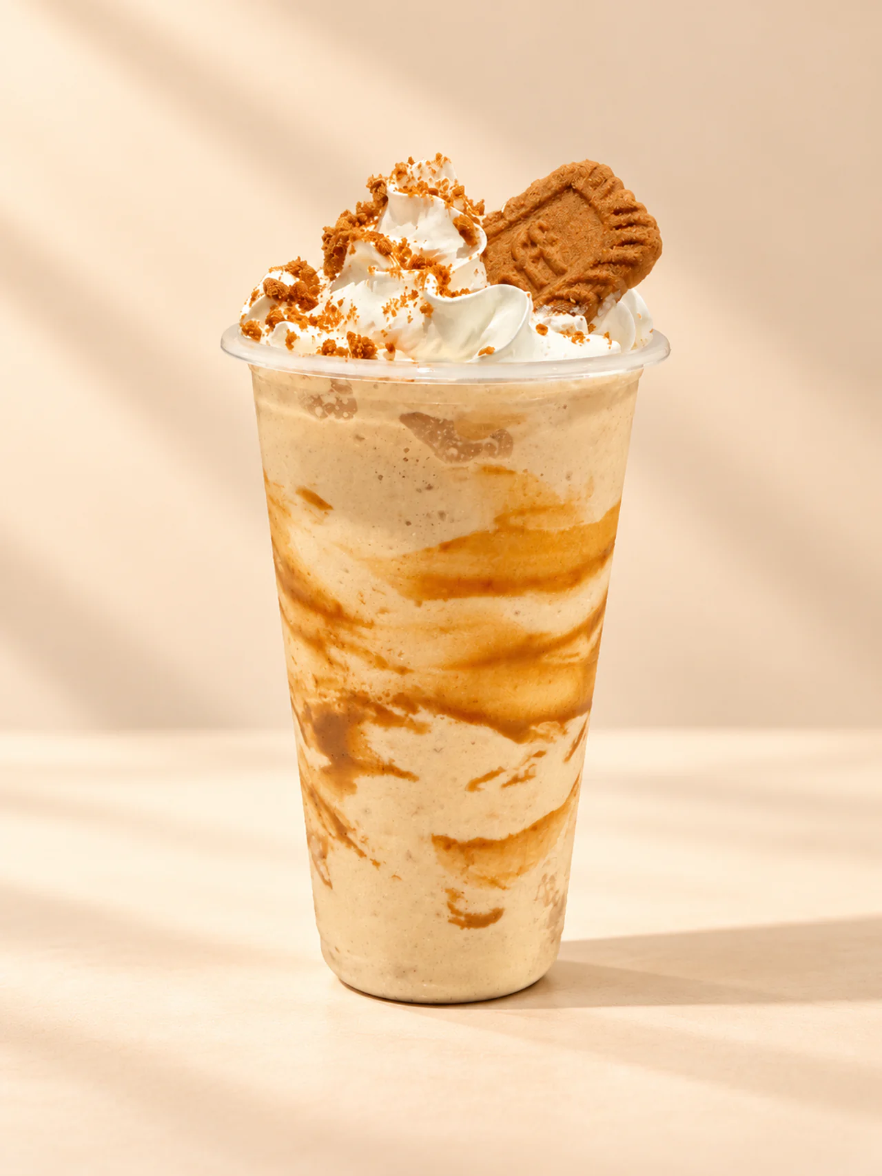Saha’s Biscoff shake with whipped topping, biscuit crumbs, and a Biscoff cookie
