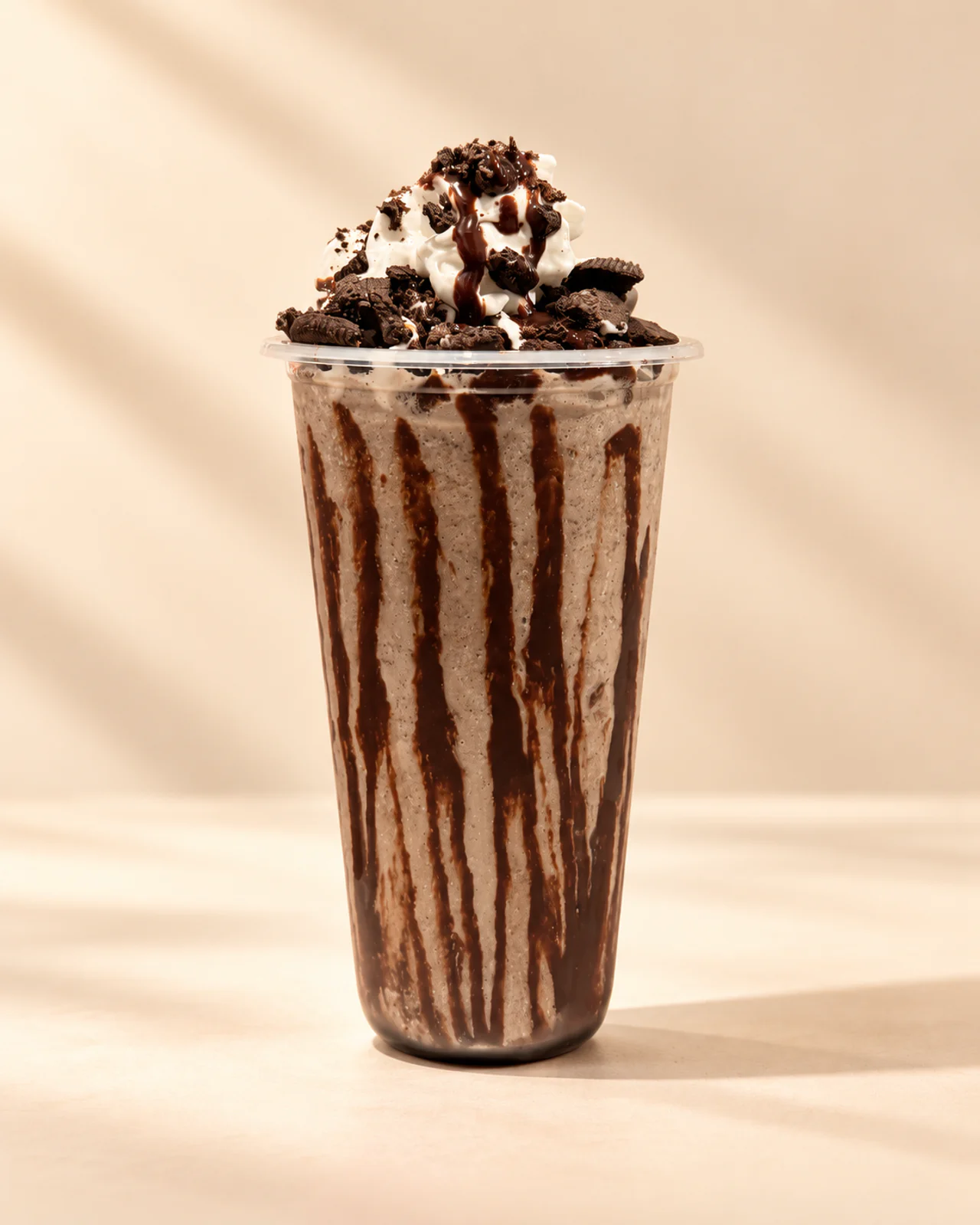 Saha’s cookies-and-cream shake with chocolate drizzle, whipped topping, and crushed cookies