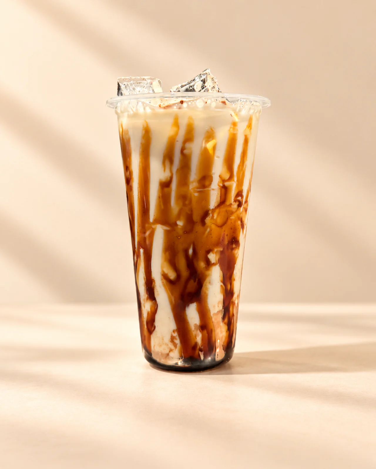 Saha’s tiger milk tea with golden syrup streaks and ice